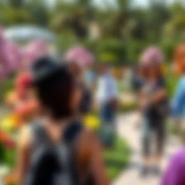 Visitors enjoying the scenic beauty of the Dubai Miracle Garden amidst floral art installations